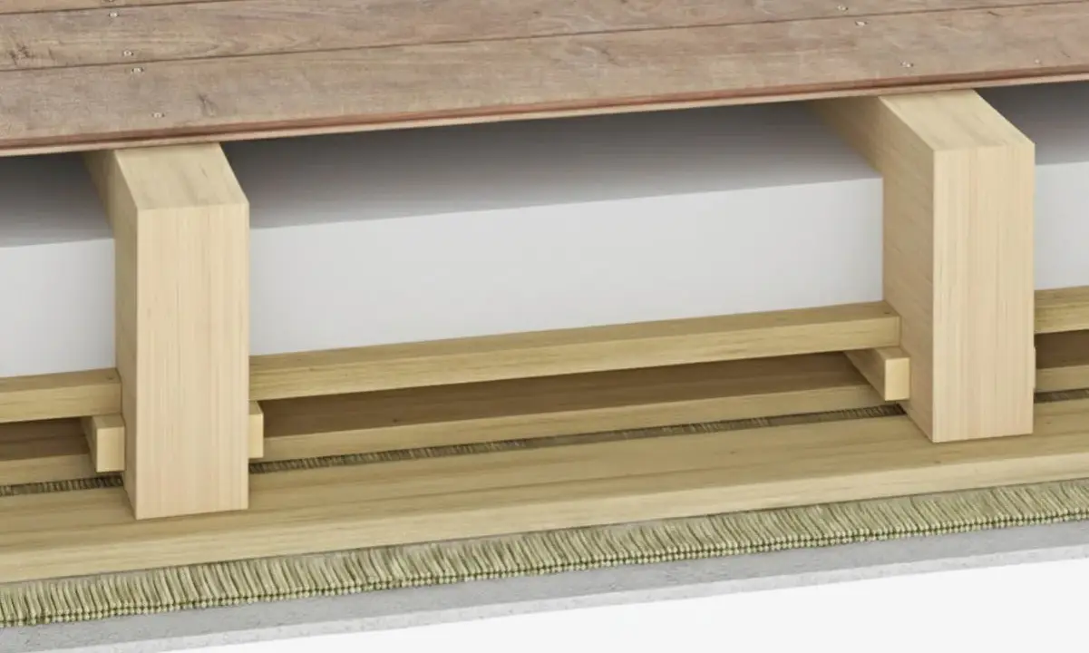Dettaglio costruttivo per isolamento acustico soffitto: legno, materiale isolante bianco e finitura a vista.